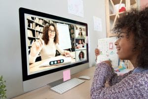 Cute African Kid Child Girl Showing Homework Talking To Remote