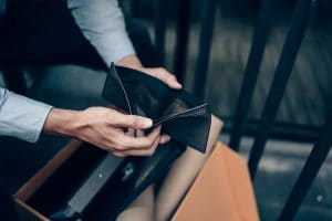 Office worker lost his job and open a wallet without money