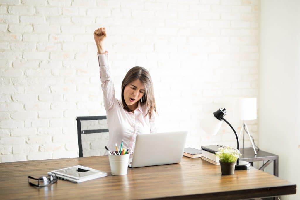 Excited Woman In An Office