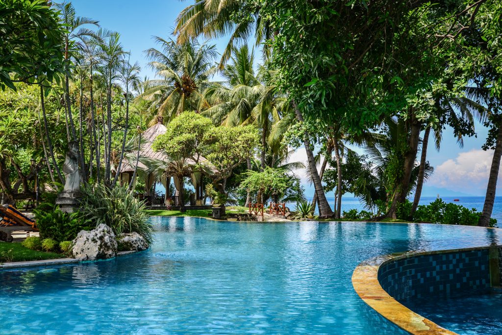 Luxury hotel "Puri Bagus Lovina Villa Resort & Spa" territory with swimming pool on Bali island, Indonesia