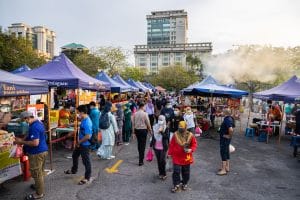 Kuala Lumpur, Malaysia - September 13, 2021: The fresh market in Putrajaya, near the capital Kuala Lumpur, is busy. Face masks are compulsory during the Covid-19 restrictions. People carry their purchases