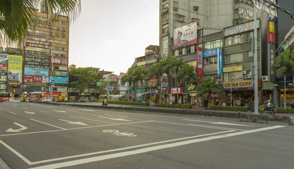 Taipei, Taiwan - Aug 8, 2018 : Street view of Roosevelt Rd in front of National Taiwan University at twilight time in Taipei, Taiwan on August 8, 2018.
