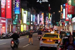 TAIPEI, TAIWAN - DECEMBER 3, 2018: People visit Ximending shopping district in Taipei. Ximending is considered one of top shopping destinations in Taiwan, catering especially youth shoppers.