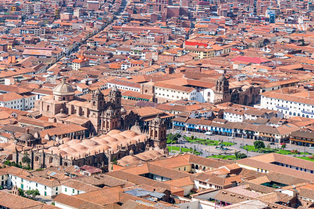 Aerial view the town of Cusco, Peru. View of Plaza de armas, Coricancha, iglesia de la Compania de Jesus, Church of Santo Domingo and cityscape of Cusco, Peru.