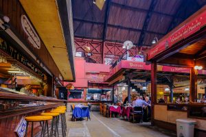 Montevideo, Uruguay, Oct 09, 2018: Famous old town Montevideo port market, mercado del puerto, with its restaurants eateries serving famous national meat meals
