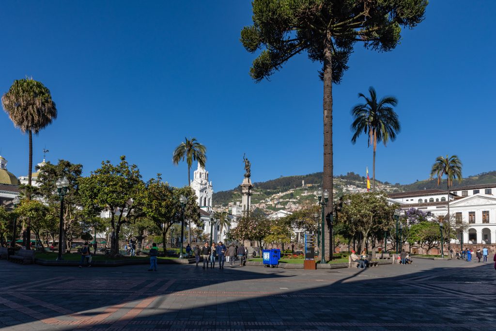 QUITO, ECUADOR - FEBRUARY 07, 2020: Plaza Grande and Metropolitan Cathedral, historic colonial downtown of Quito, Ecuador. South America.