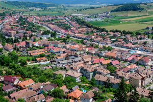 View from the stone walls at the Rupea Citadel (Cetatea Rupea) after renovation towards a small town in Brasov county, in the southern part of Transylvania (Transilvania) region, Romania in summer