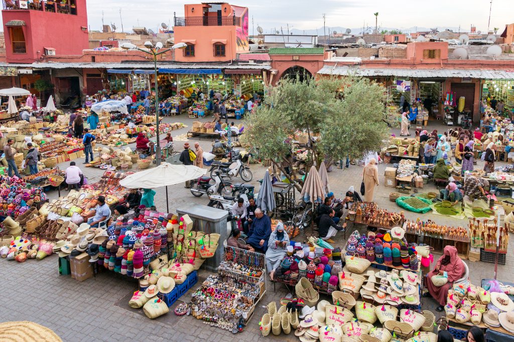 MARRAKESH, MOROCCO - APR 28, 2016: Local people selleing their goods at the berber market in the souks of Marrakech.