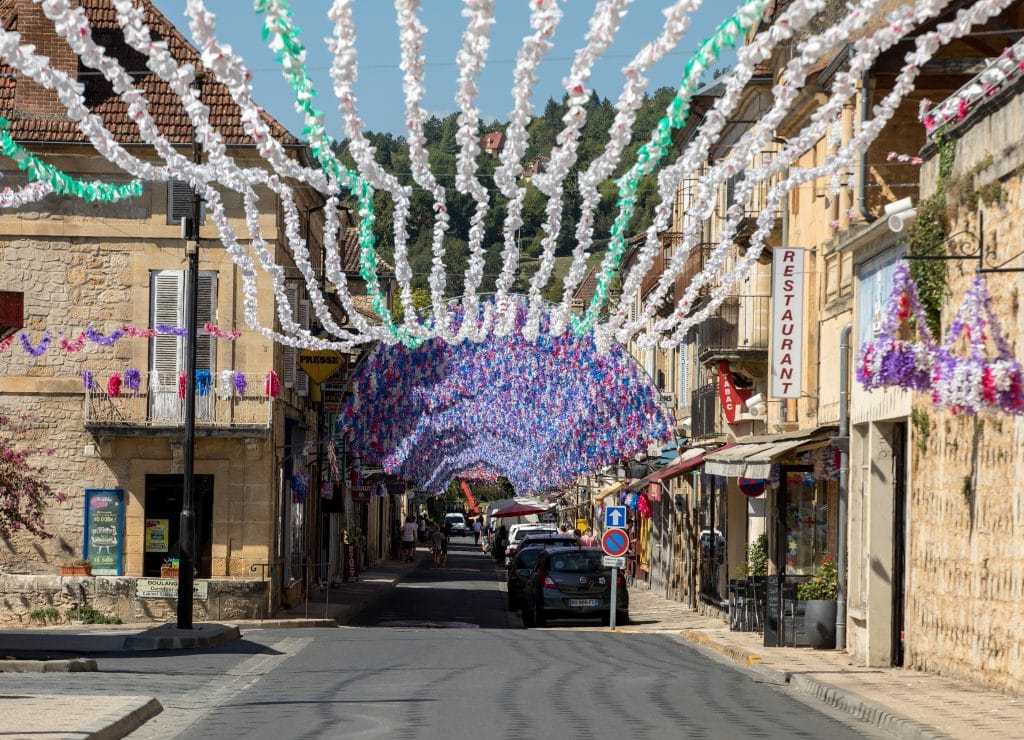 Colourful street decorations during the summer Felibree in Saint Cyprien