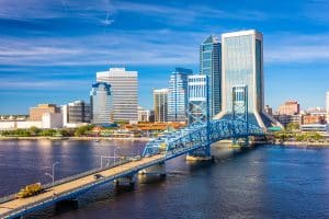 Jacksonville, Florida, USA downtown skyline at dusk over St. Joh