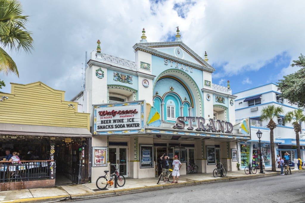 KEY WEST, USA - AUG 26, 2014: people at Key West cinema theater Strand in Key West, Florida, USA, It is a historic cinema but still in use.