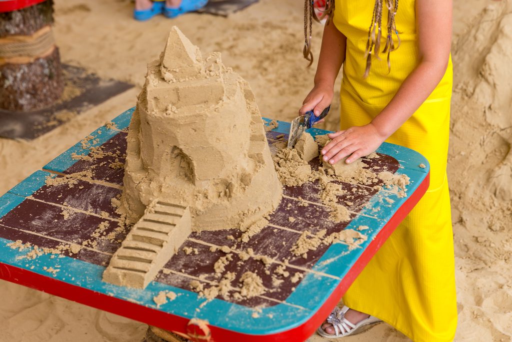 Sand Castle Made By Kids On A Craft Lesson On Beach