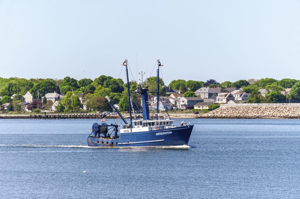 Fairhaven, Massachusetts, USA - June 1, 2020: Commercial fishing boat Anticipation, hailing port Cape May, NJ, heading into New Bedford