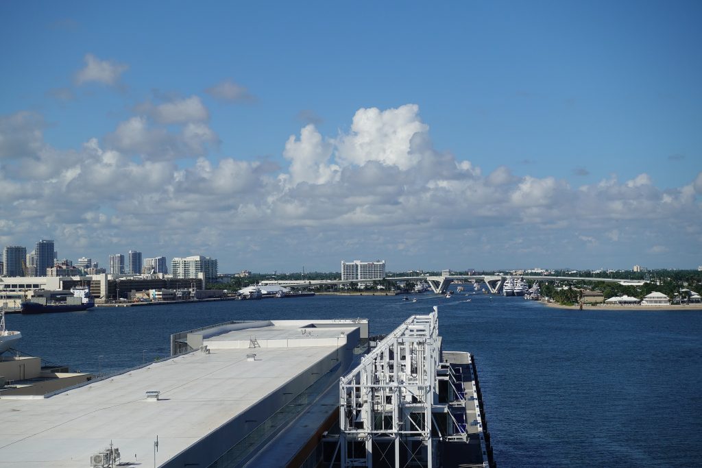 Ft. Lauderdale, FL/USA-10/31/19: The view from a cruise ship of Port Everglades, in Ft. Lauderdale, Florida of the channel out to the ocean with a view of the skyline.