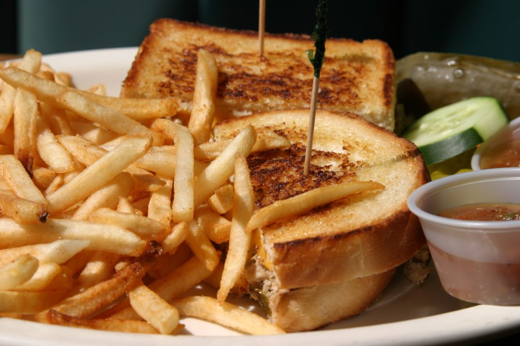 tuna melt with freedom fries for lunch in a diner in Huntington Beach California aka Surf City